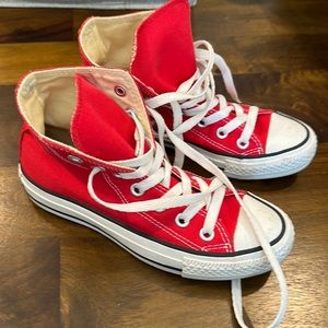Red converse high tops